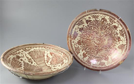 Two Hispano-Moresque copper lustre bowls, 17th/18th century diameter 36cm and 34cm